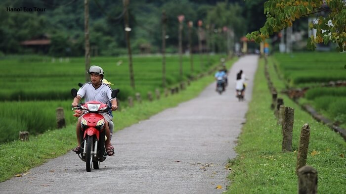 A local riding scooters in Mai Chau